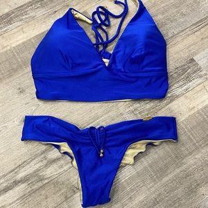 Luli fama royal blue and gold reversible bikini